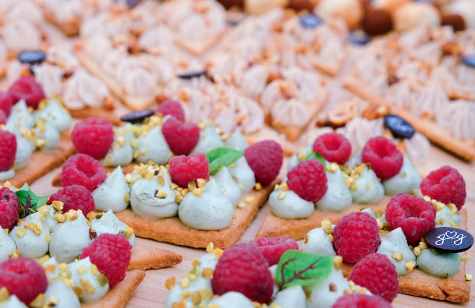 Assortment of gluten-free desserts on plates and trays.