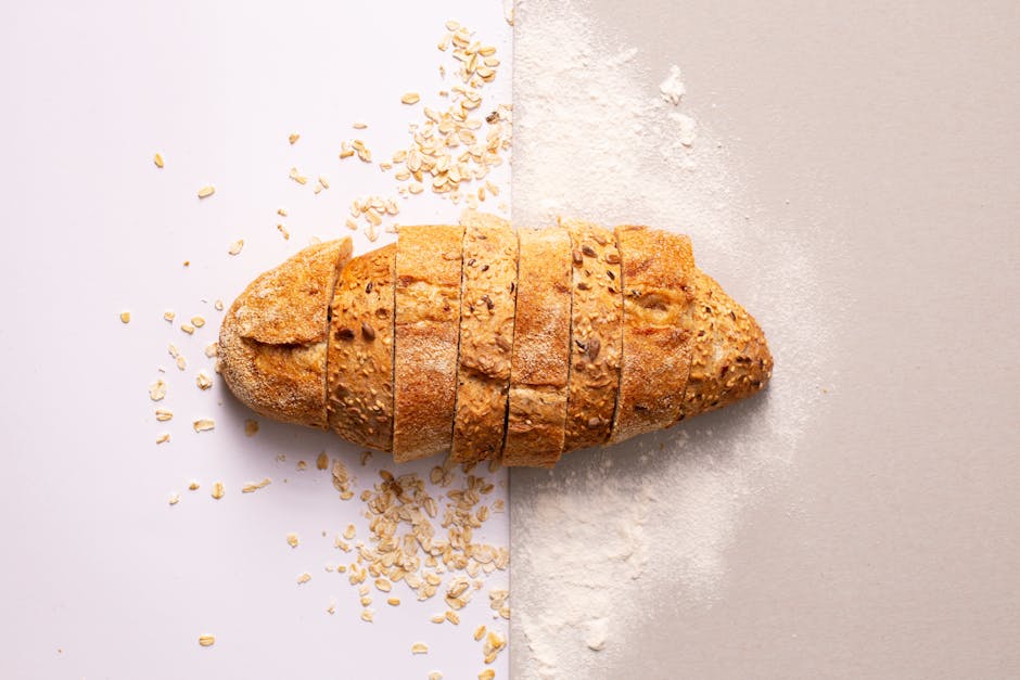 Freshly baked sourdough bread with golden crust and scoring marks.